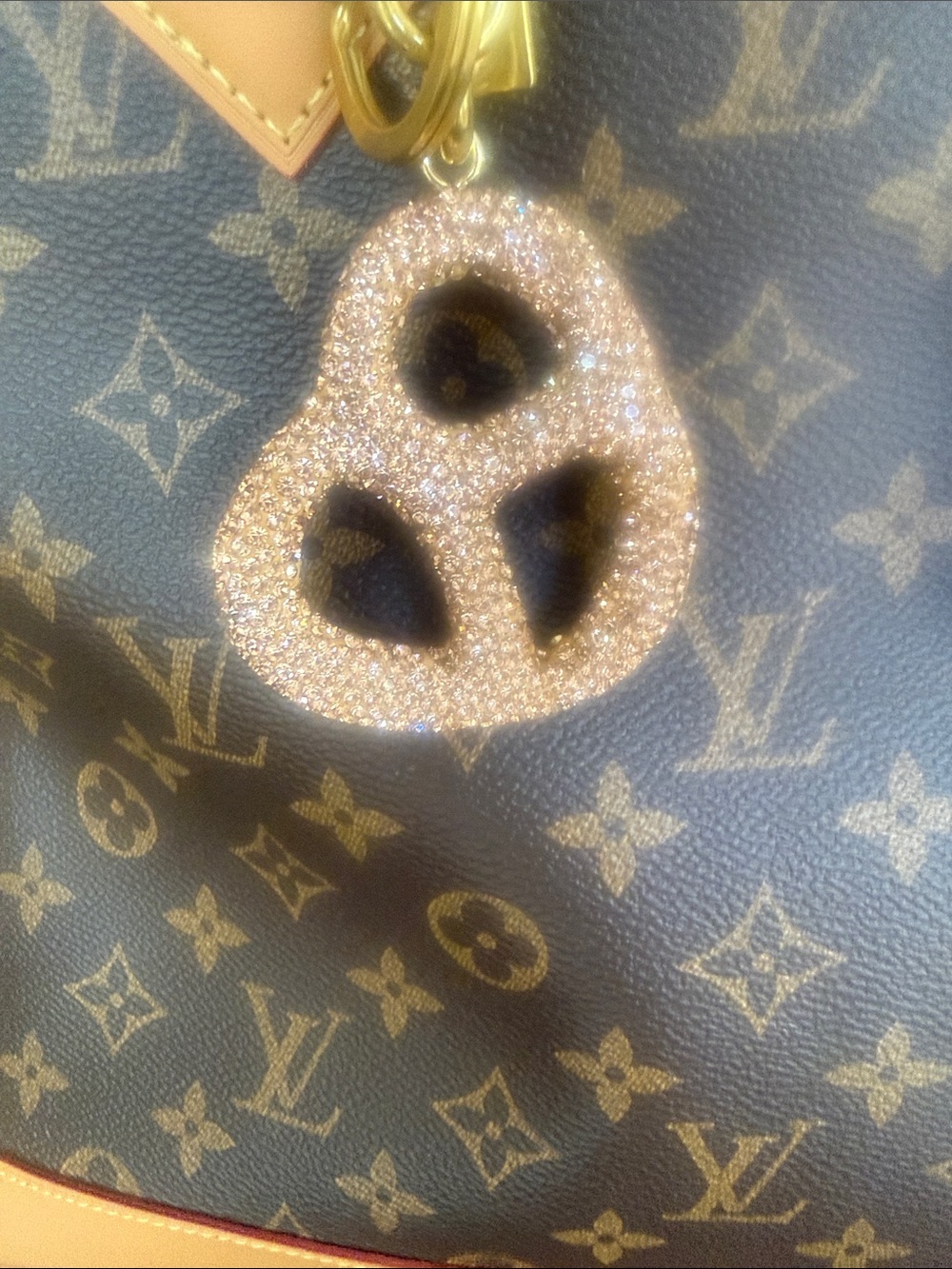Crystal pretzel bag charm with brass